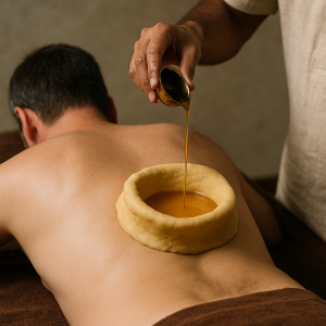 Kati Basti therapy with warm oil in a dough ring on the lower back, poured by a therapist